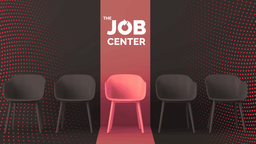 A single chair in a row of chairs is lit up by a column of light, symbolizing high applicant volume